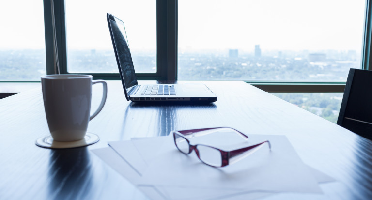 157930172 laptop glasses desk office v2